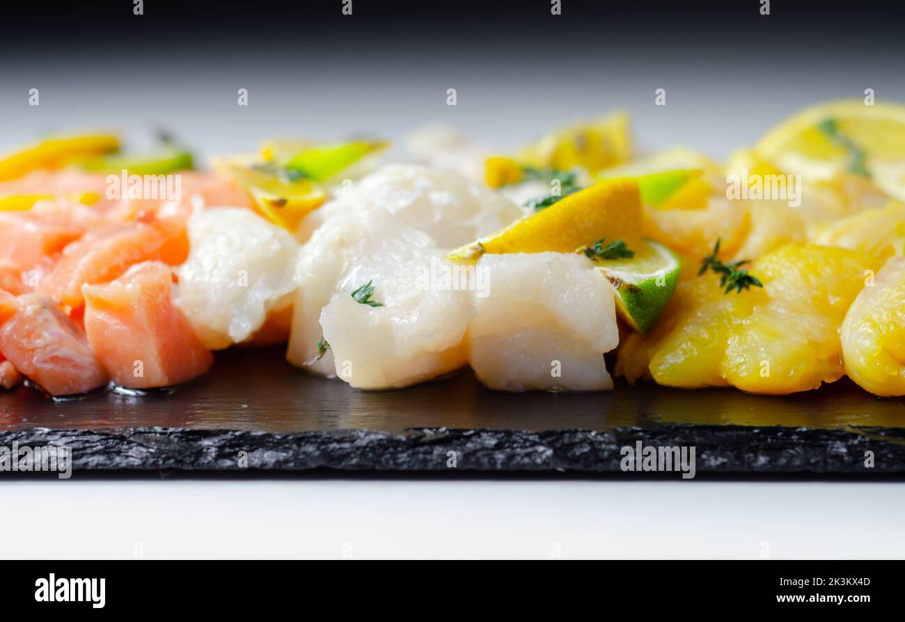 Fish pie mix, raw skinless and boneless cod, dyed smoked haddock and