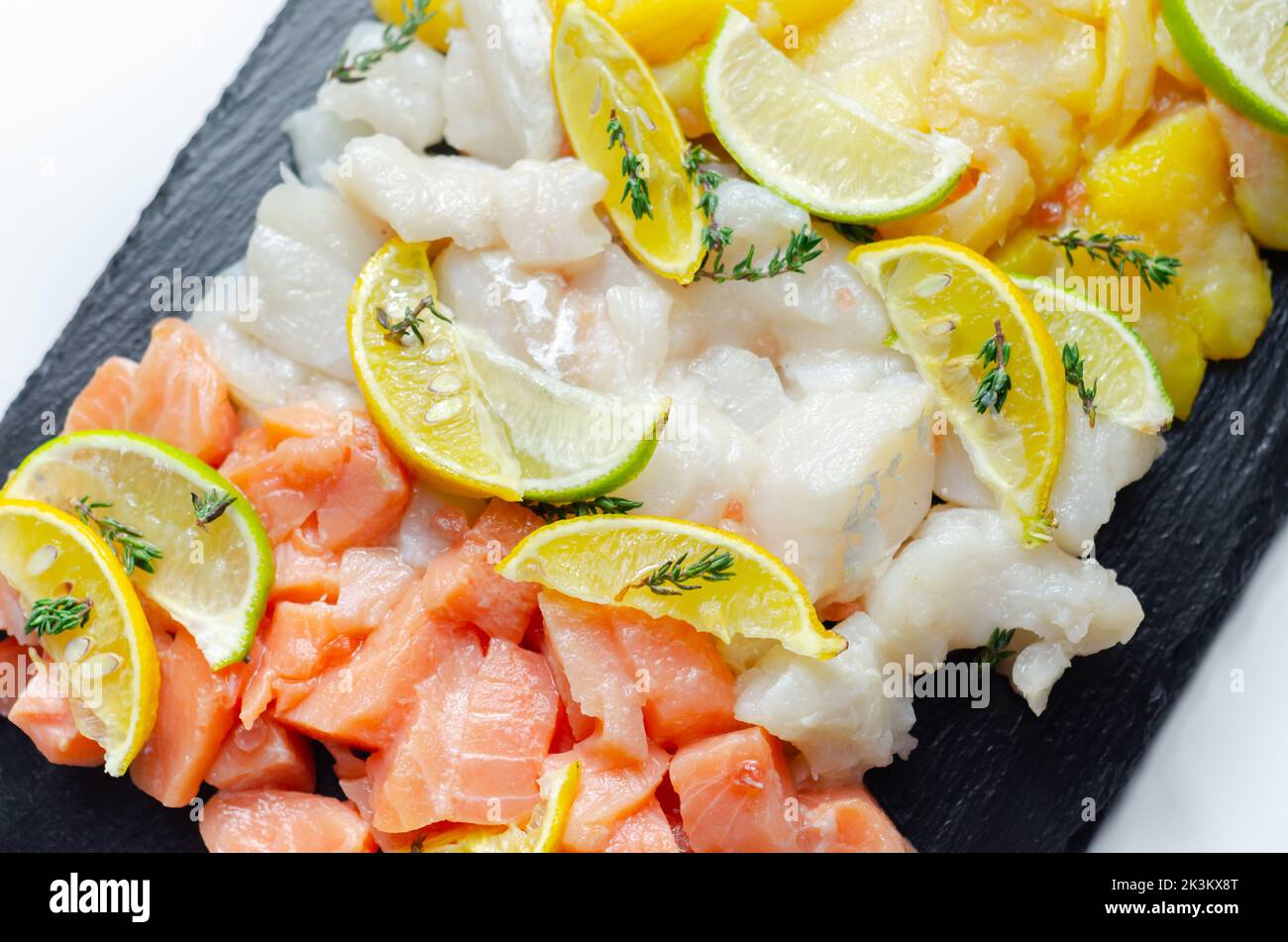 Fish pie mix, raw skinless and boneless cod, dyed smoked haddock and