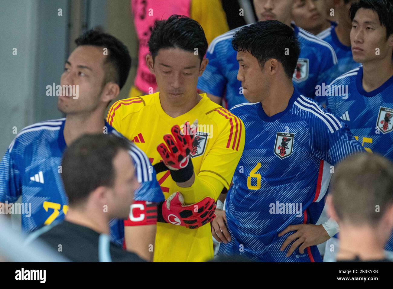 Dusseldorf, North Rhine Westphalia, Germany. 23rd Sep, 2022. Japan starting goalkeeper SHUICHI GONDA (12, second from left) adjusts his sleeve before going onto the pitch for the 2022 Kirin Challenge Cup against the US in the Merkur Spiel Arena in Duuseldorf, Germany. (Credit Image: © Kai Dambach/ZUMA Press Wire) Stock Photo