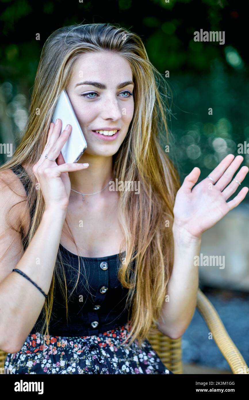 Natural beauty portrait of young woman in her 20s with long hair and ...