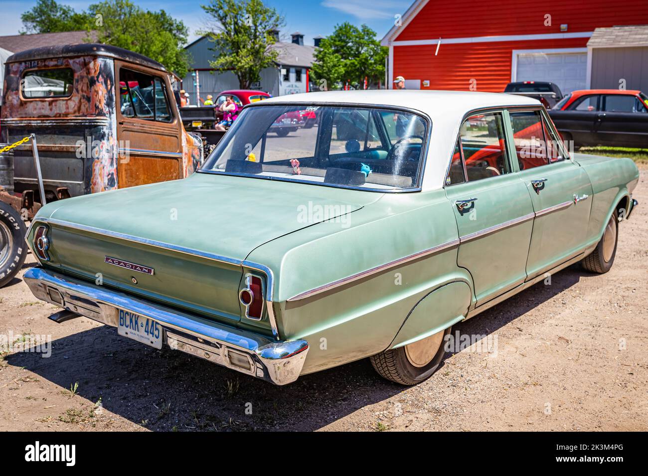 Falcon Heights, MN - June 18, 2022: High perspective rear corner view of a 1963 Acadian Invader 4 Door Sedan at a local car show. Stock Photo