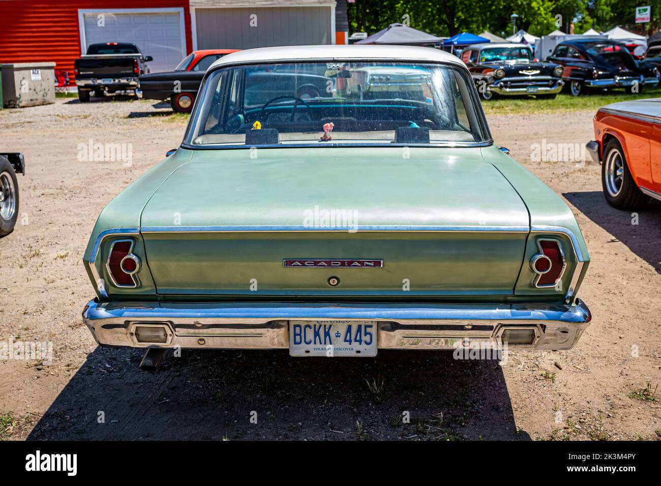 Falcon Heights, MN - June 18, 2022: High perspective rear view of a 1963 Acadian Invader 4 Door Sedan at a local car show. Stock Photo