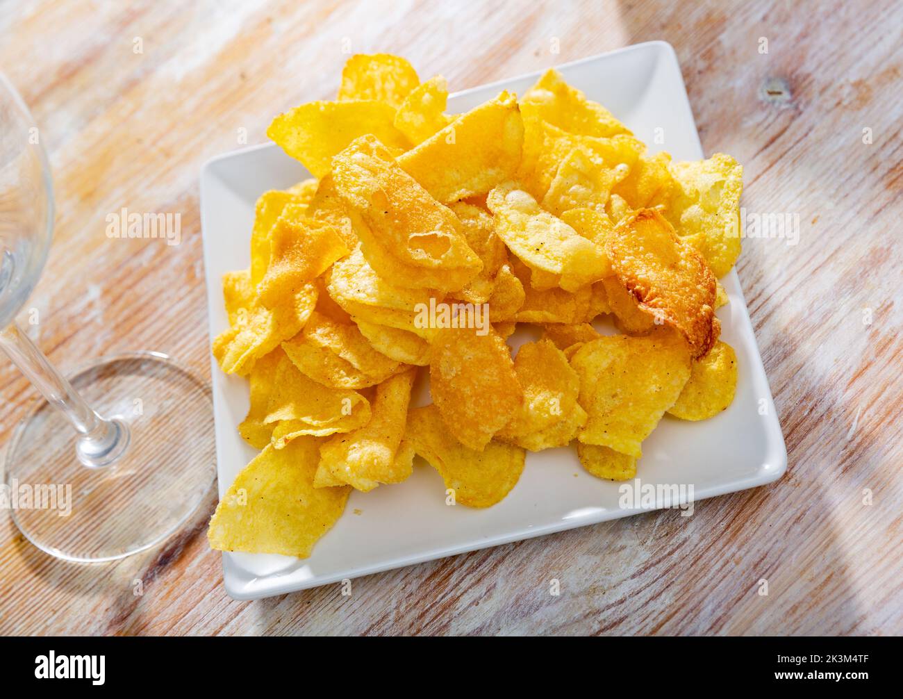 Crispy salty potato chips with natural taste on plate Stock Photo Alamy