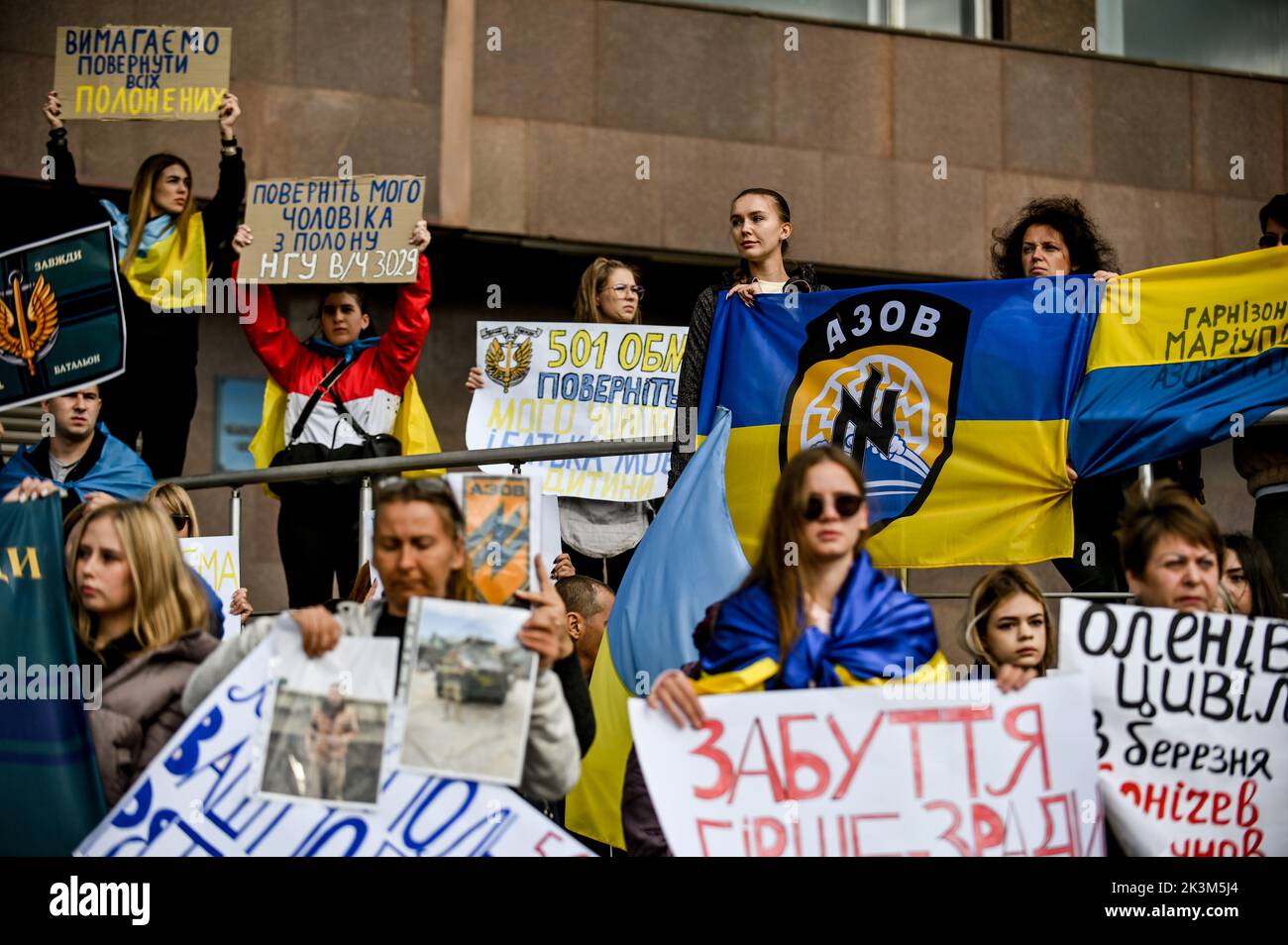 ZAPORIZHZHIA, UKRAINE - SEPTEMBER 25, 2022 - Activists hold placards calling for the release of Mariupol defenders and civilians who are currently in Stock Photo