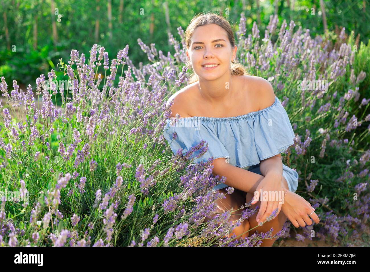 Portrait of woman with basket on lavender field Stock Photo