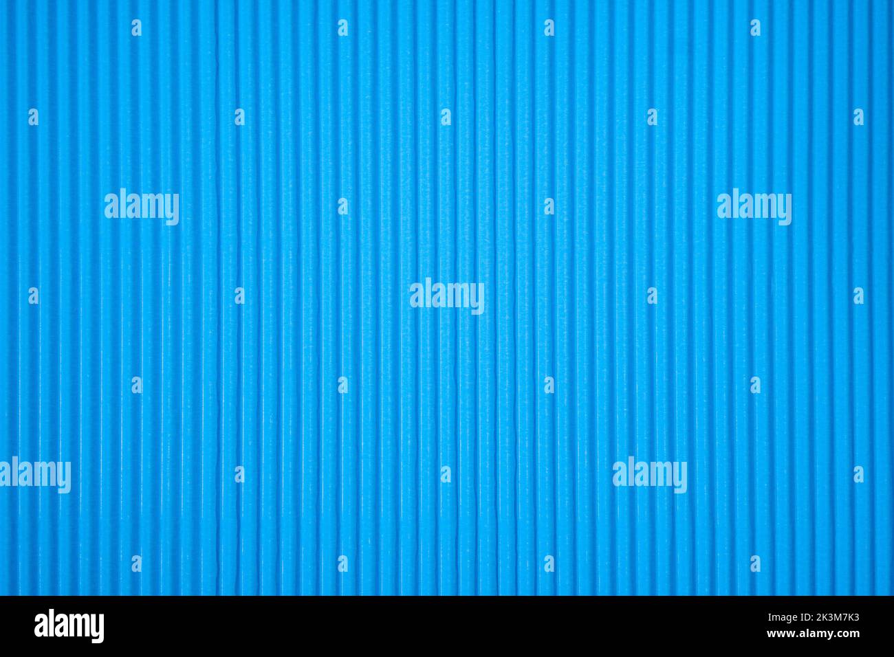 Decorative background. Background texture of corrugated blue cardboard ...