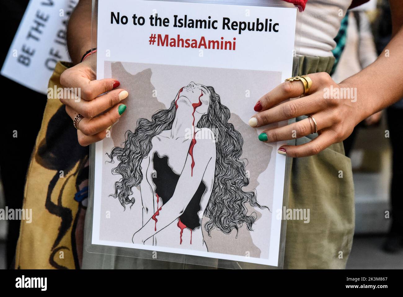 People participate in a protest against the Islamic regime of Iran and the death of Mahsa Amini in New York City, New York, U.S., September 27, 2022.  REUTERS/Stephanie Keith Stock Photo