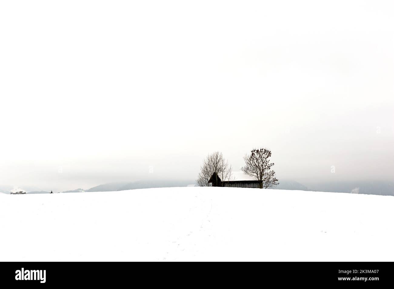 Shed on top of hill in the winter Stock Photo