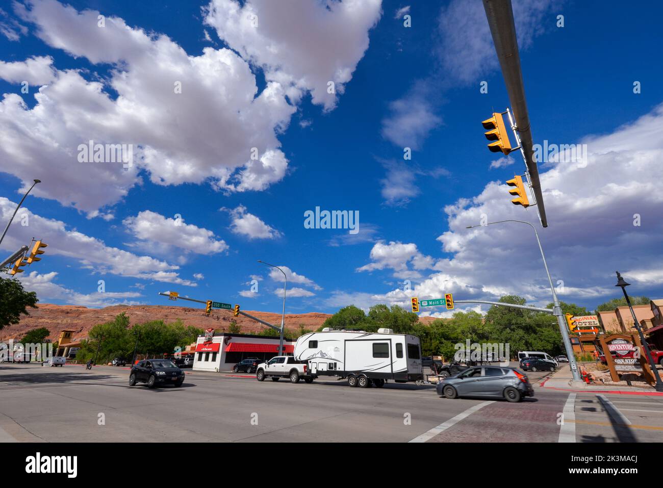 Street view of the traffic at a crossroads in Moab Utah USA Stock Photo