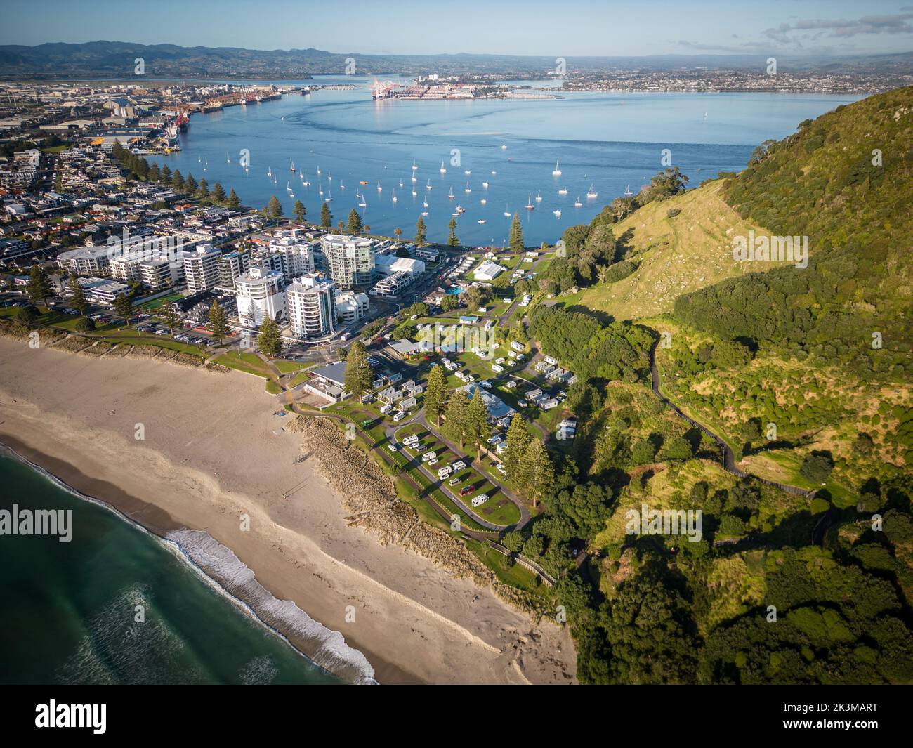 An aerial view of Mount Maunganui with Bay of Plenty and modern buildings, Tauranga, New Zealand Stock Photo