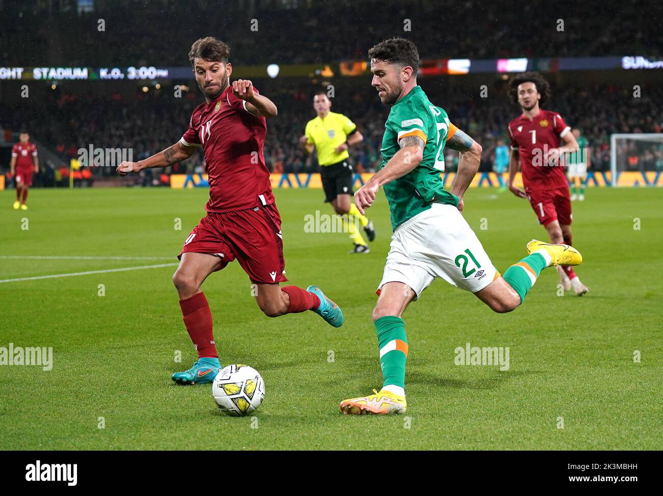 Republic of Ireland's Robbie Brady (right) attempts to cross the ball during the UEFA Nations League match at the Aviva Stadium in Dublin, Ireland. Picture date: Tuesday September 27, 2022. Stock Photo