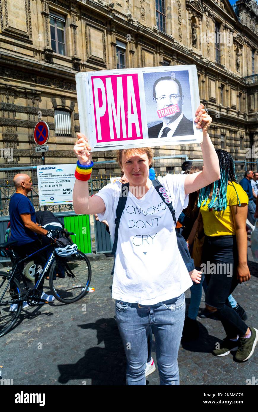 Paris, France, Lesbian Activist Holding Protest Sign for Surrogate Motherhood, at LGBTQI+ Pride March, Alice Coffin Stock Photo