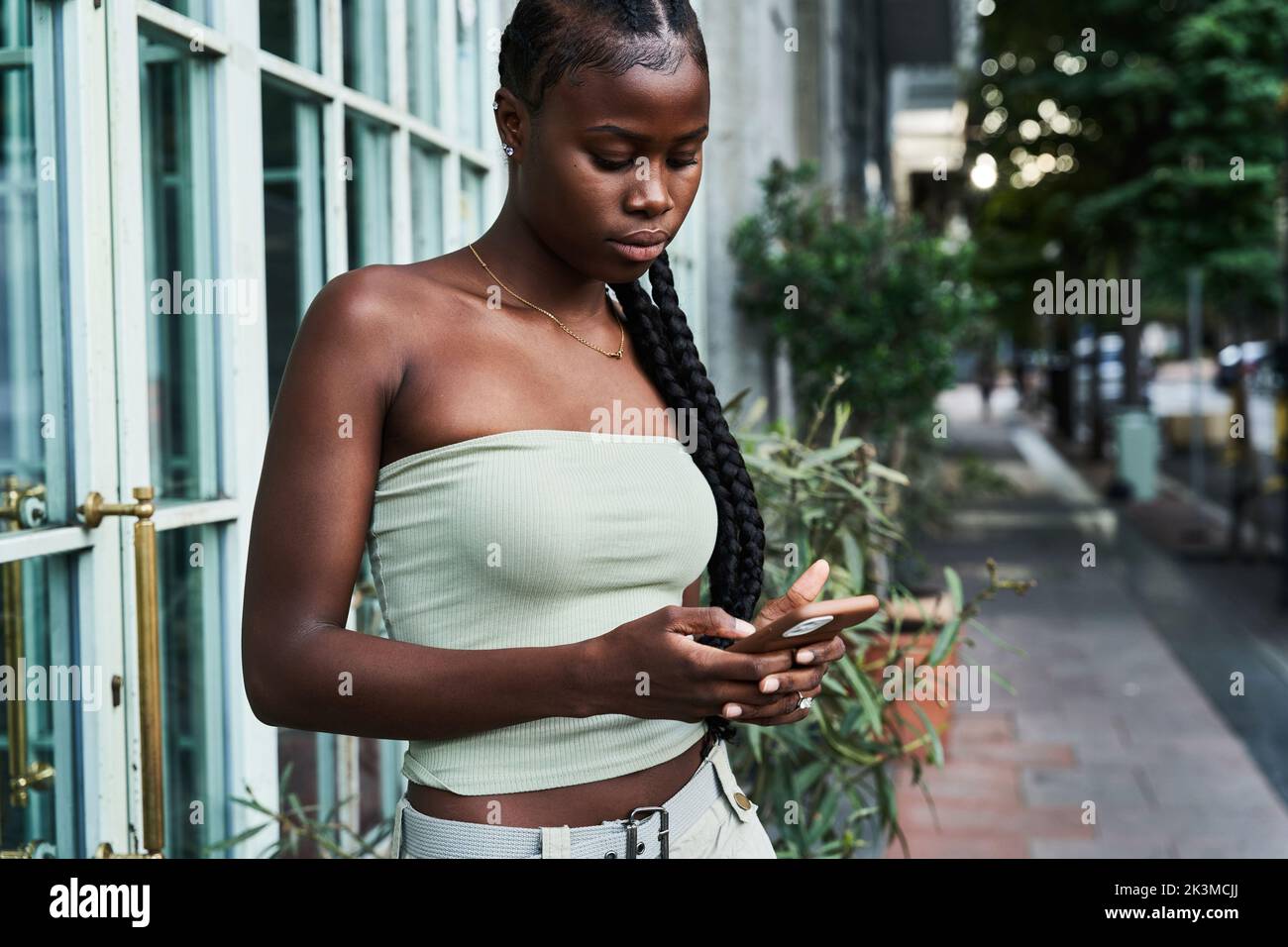 Pensive african woman braids using hi-res stock photography and images ...