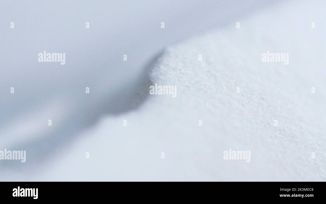 White polyamide powder for printing powder 3d printer close-up. Powder for high-speed printing of 3D printer on working surface inside printer. New modern printing technology. Multi Jet Fusion MJF Stock Photo