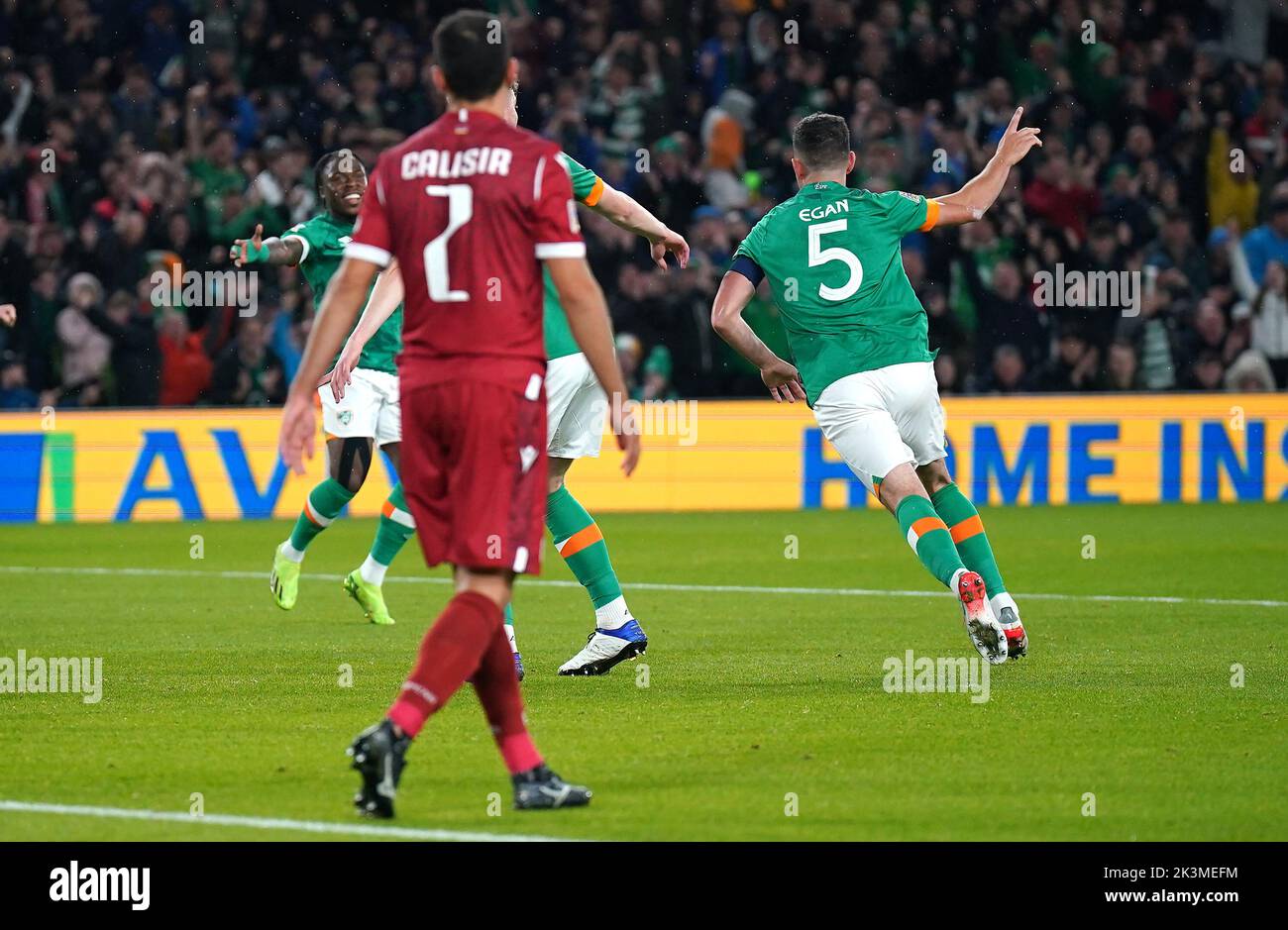 Republic of Ireland's John Egan (right) celebrates scoring their side's first goal of the game during the UEFA Nations League match at the Aviva Stadium in Dublin, Ireland. Picture date: Tuesday September 27, 2022. Stock Photo