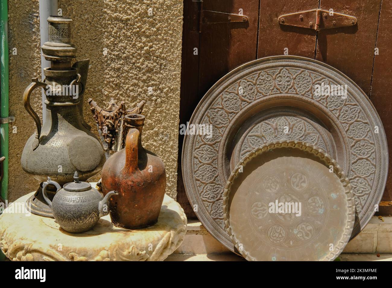Arabian-style cookware in the street souvenir store.Traditional Gulf and African countries utensil Stock Photo