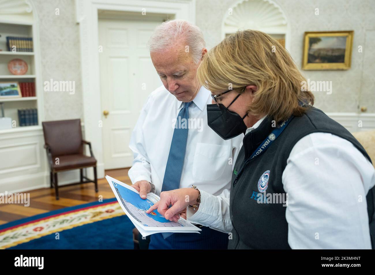 Washington, United States. 27th Sep, 2022. U.S. President Joe Biden, discusses Hurricane Ian with FEMA administrator Deanne Criswell, right, in the Oval Office of the White House, September 27, 2022, in Washington, DC Credit: Adam Schultz/White House Photo/Alamy Live News Stock Photo