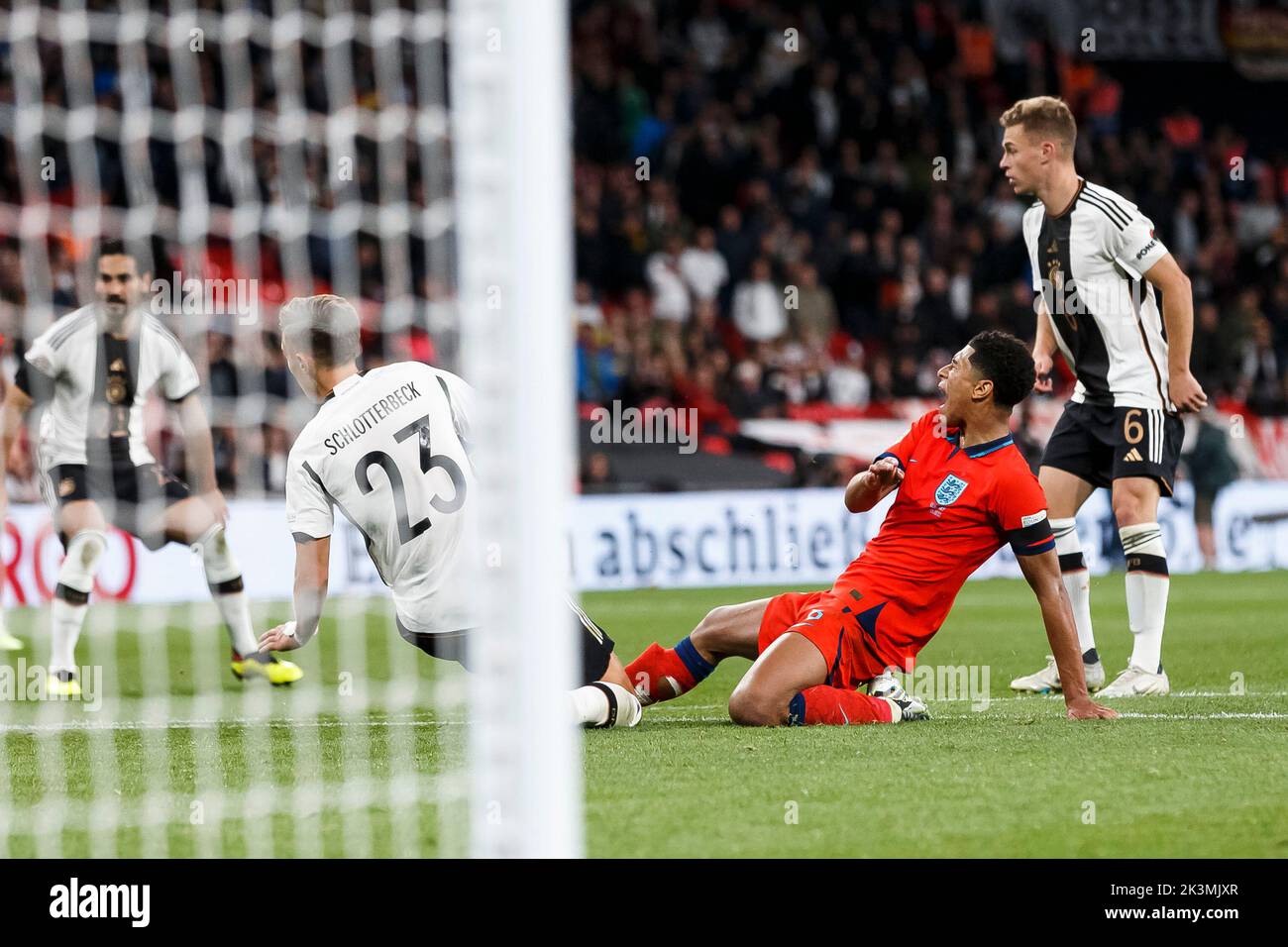 London, UK. 26th Sep, 2022. Jude Bellingham of England is fouled by Nico Schlotterbeck of Germany for a penalty during the UEFA Nations League Group C match between England and Germany at Wembley Stadium on September 26th 2022 in London, England. (Photo by Daniel Chesterton/phcimages.com) Credit: PHC Images/Alamy Live News Stock Photo