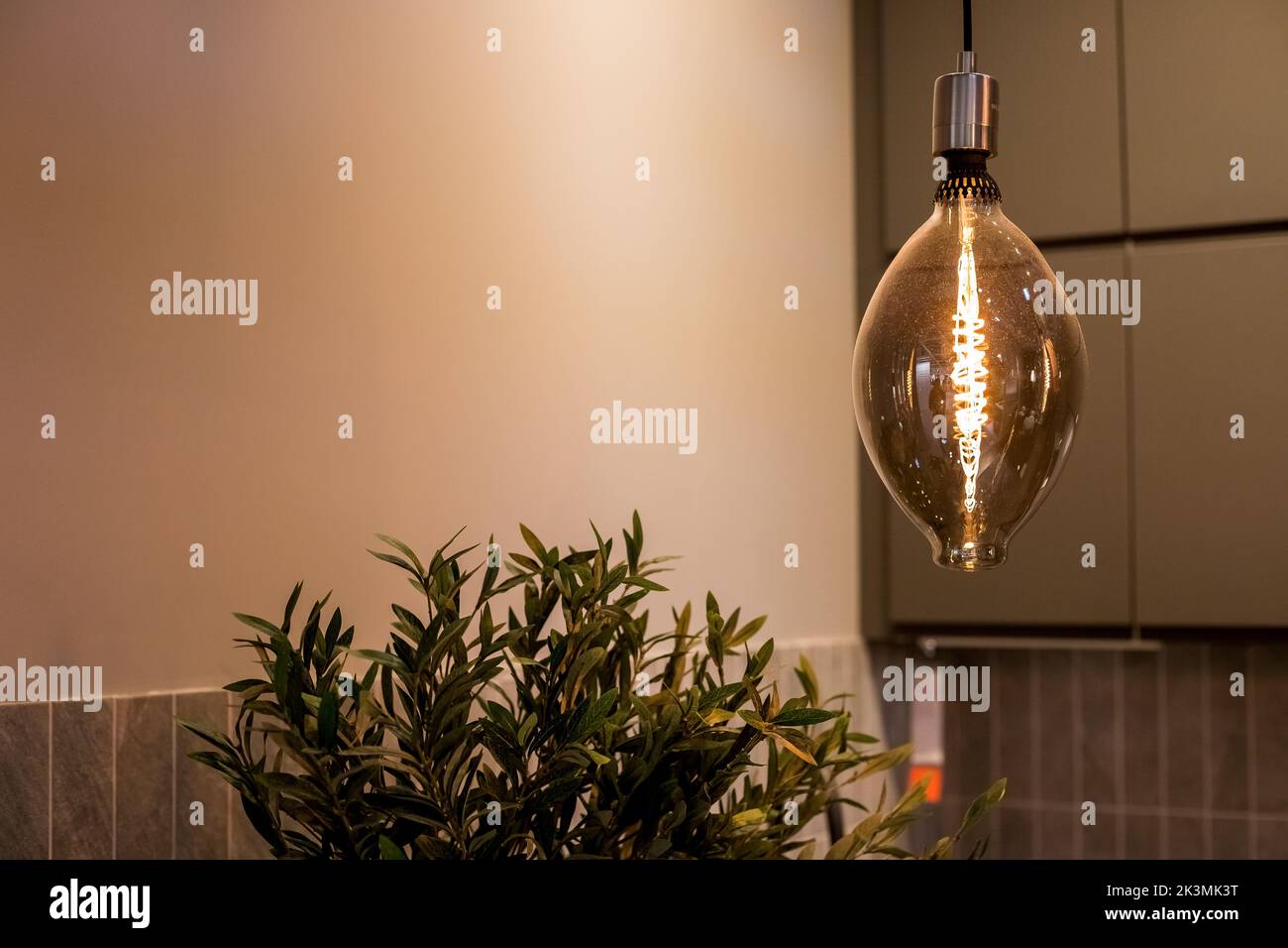 Vintage LED lamp in the interior of the kitchen.Incandescent electric