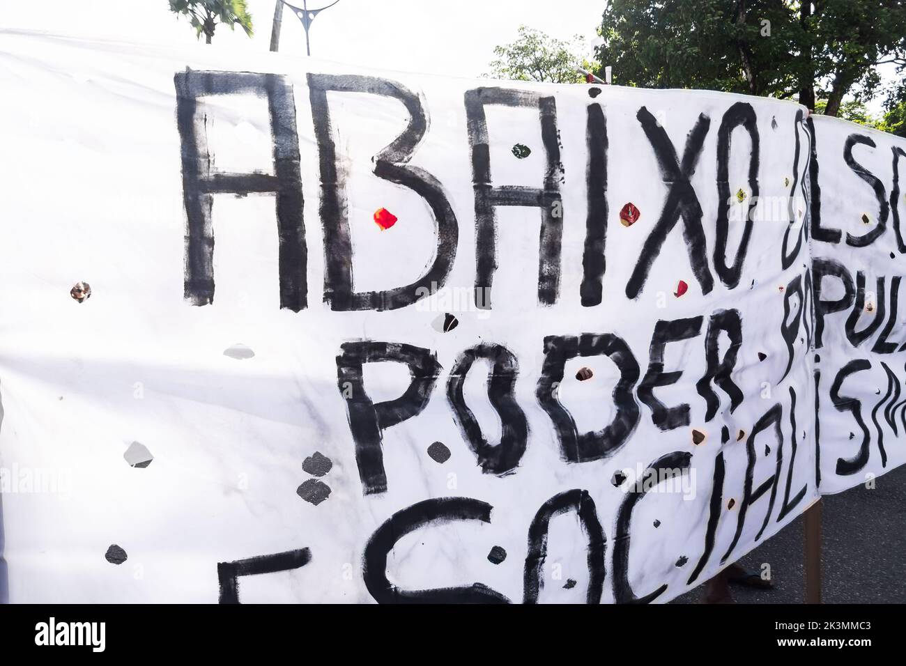 Salvador, Bahia, Brazil - November 20, 2021: Brazilians protest with banners and posters with words against the government of President Jair Bolsonaro Stock Photo