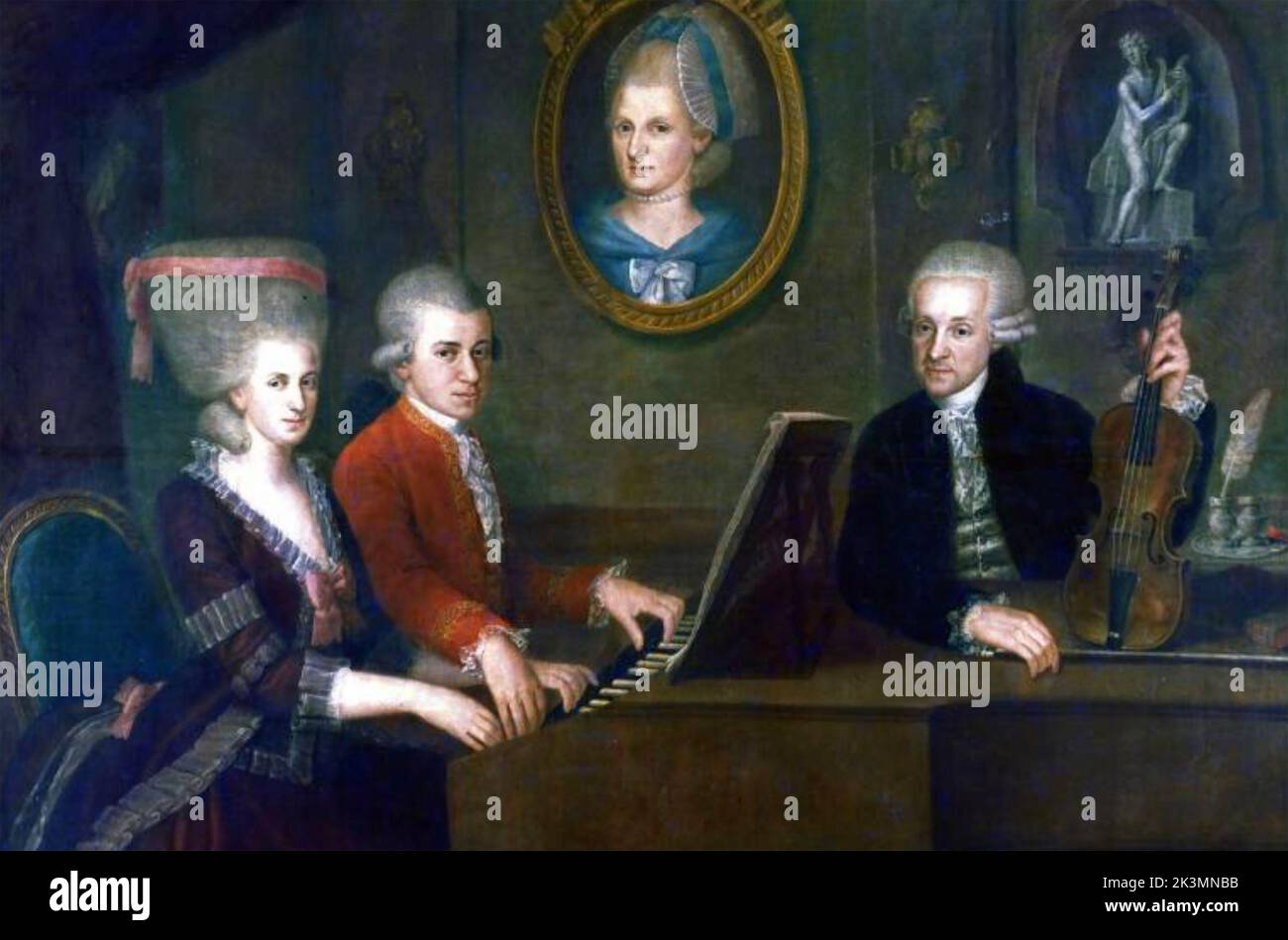 WOLFGANG AMADEUS MOZART (1756-1791)  Austrian composer with his sister Maria Anna and father Leopold in 1780. The portrait on the wall is his mother Anna Maria who had died in 1778. Stock Photo