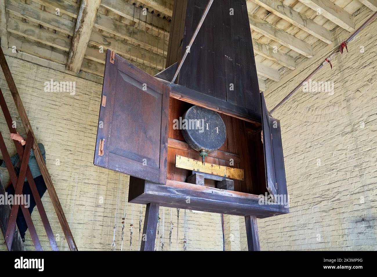 The pendulum of the clock at St George's Church in Ramsgate, Kent Stock Photo