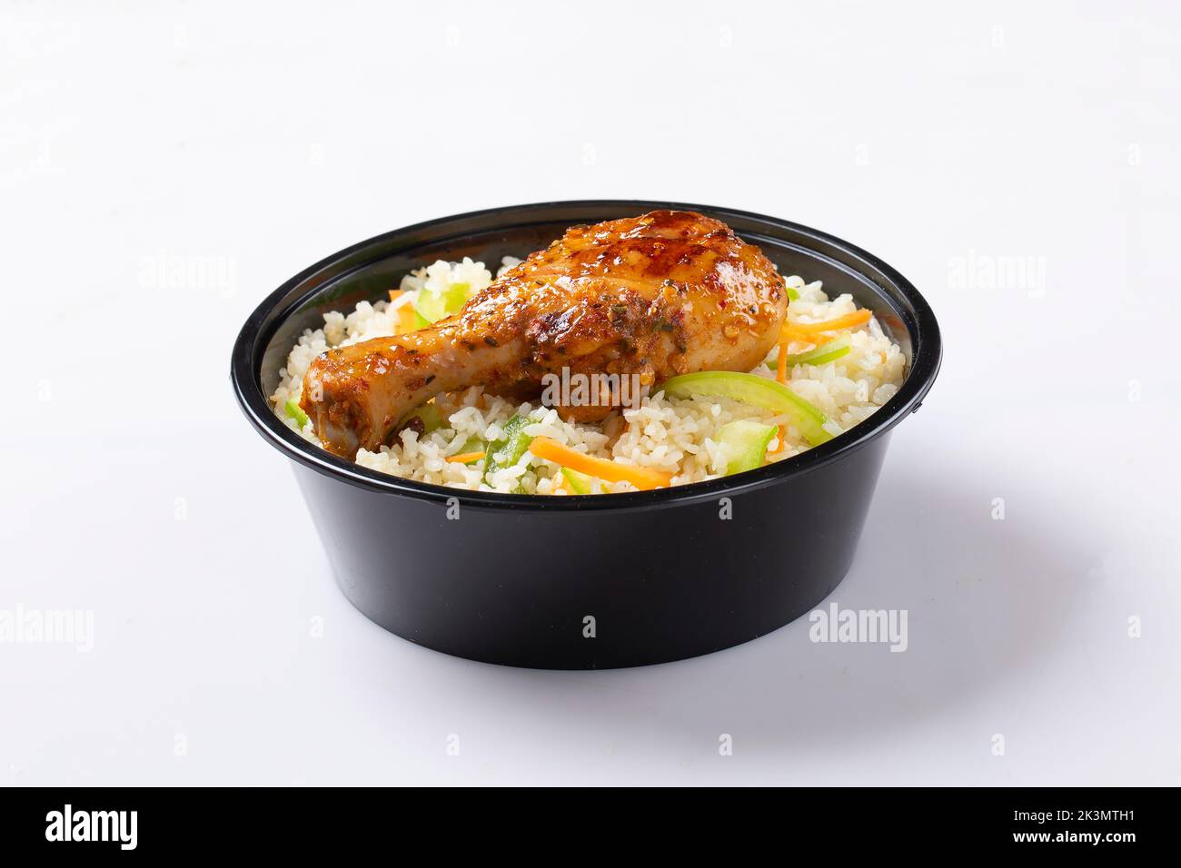 Schezwan Chicken Fried Rice in white bowl isolated on white background