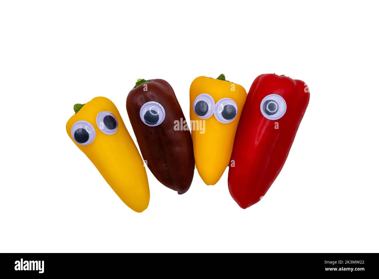 Assorted Mini Peppers with Googly Eyes face Stock Photo