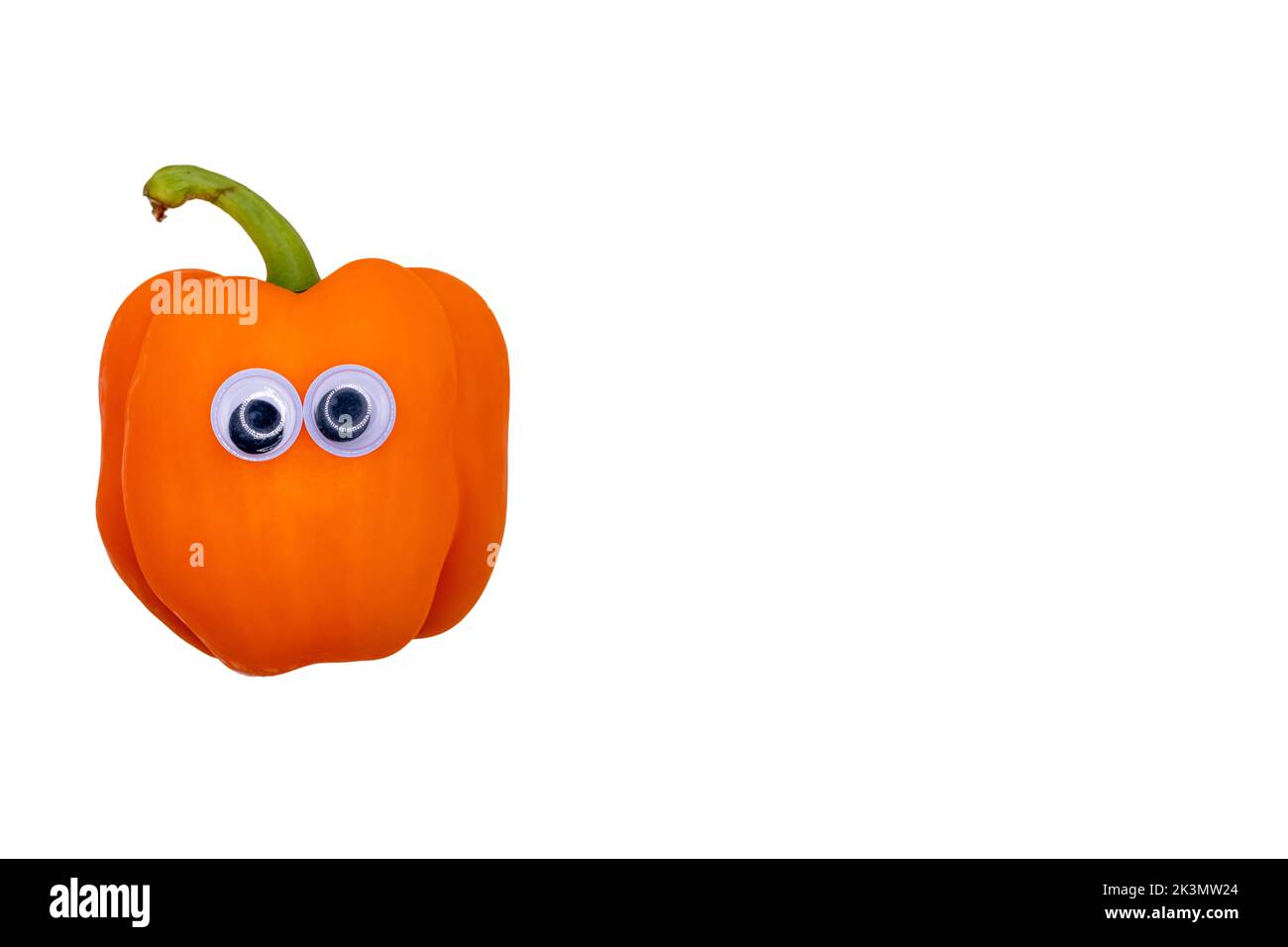 Orange Bell Pepper face with Googly Eyes Stock Photo