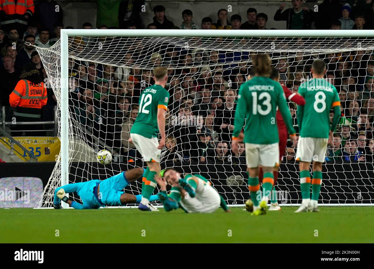 Armenia's Artak Dashyan (hidden) scores their side's first goal of the game during the UEFA Nations League match at the Aviva Stadium in Dublin, Ireland. Picture date: Tuesday September 27, 2022. Stock Photo