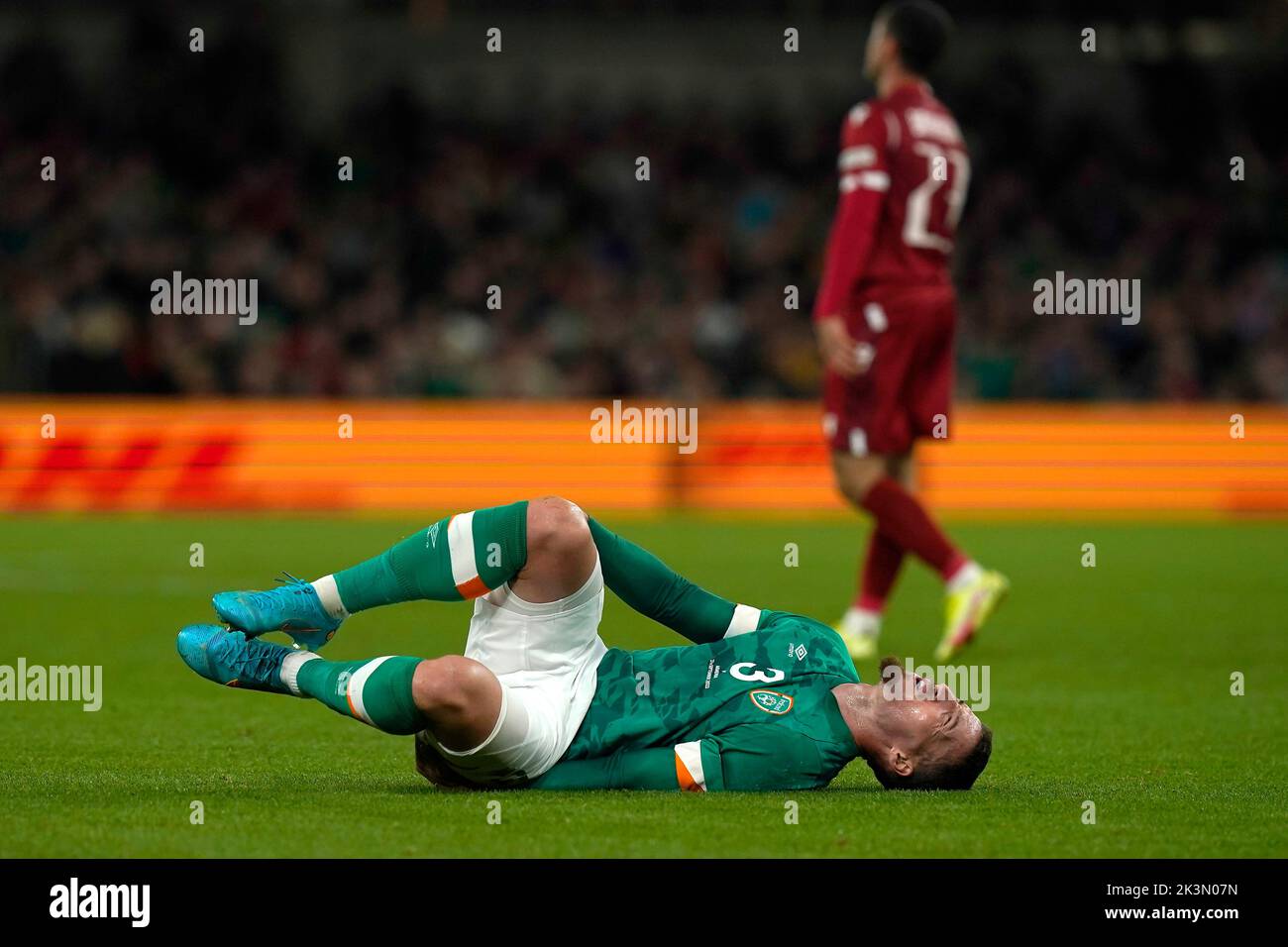 Republic of Ireland's Matt Doherty falls to the floor in pain during the UEFA Nations League match at the Aviva Stadium in Dublin, Ireland. Picture date: Tuesday September 27, 2022. Stock Photo