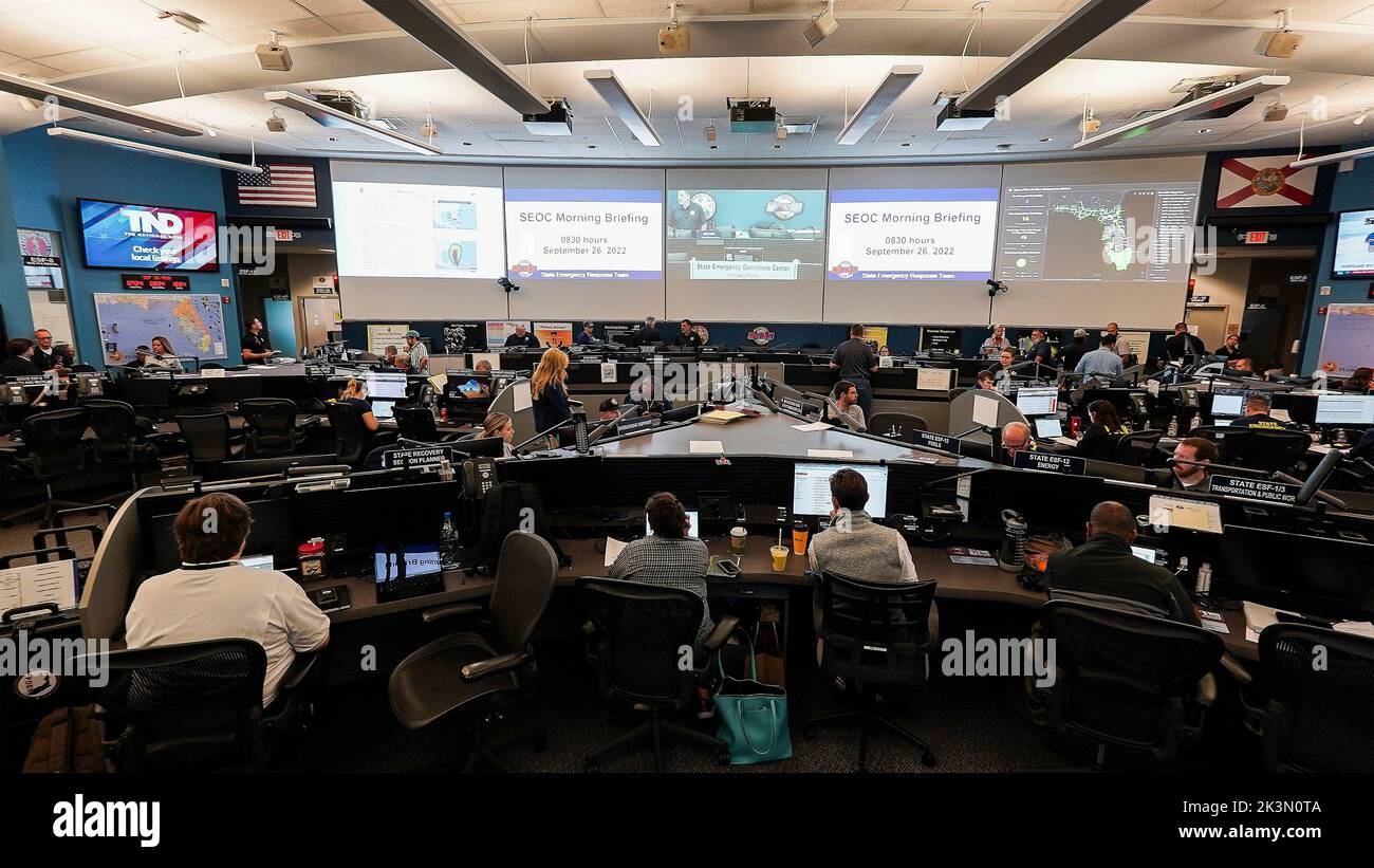 Tallahassee, United States. 26th Sep, 2022. Emergency management personnel man the Florida Department of Emergency Management command center as Hurricane Ian positions to strike the west coast of Florida as a Category 4 catastrophic storm, September 26, 2022 in Tallahassee, Florida. Credit: Robert Kaufmann/FEMA/Alamy Live News Stock Photo