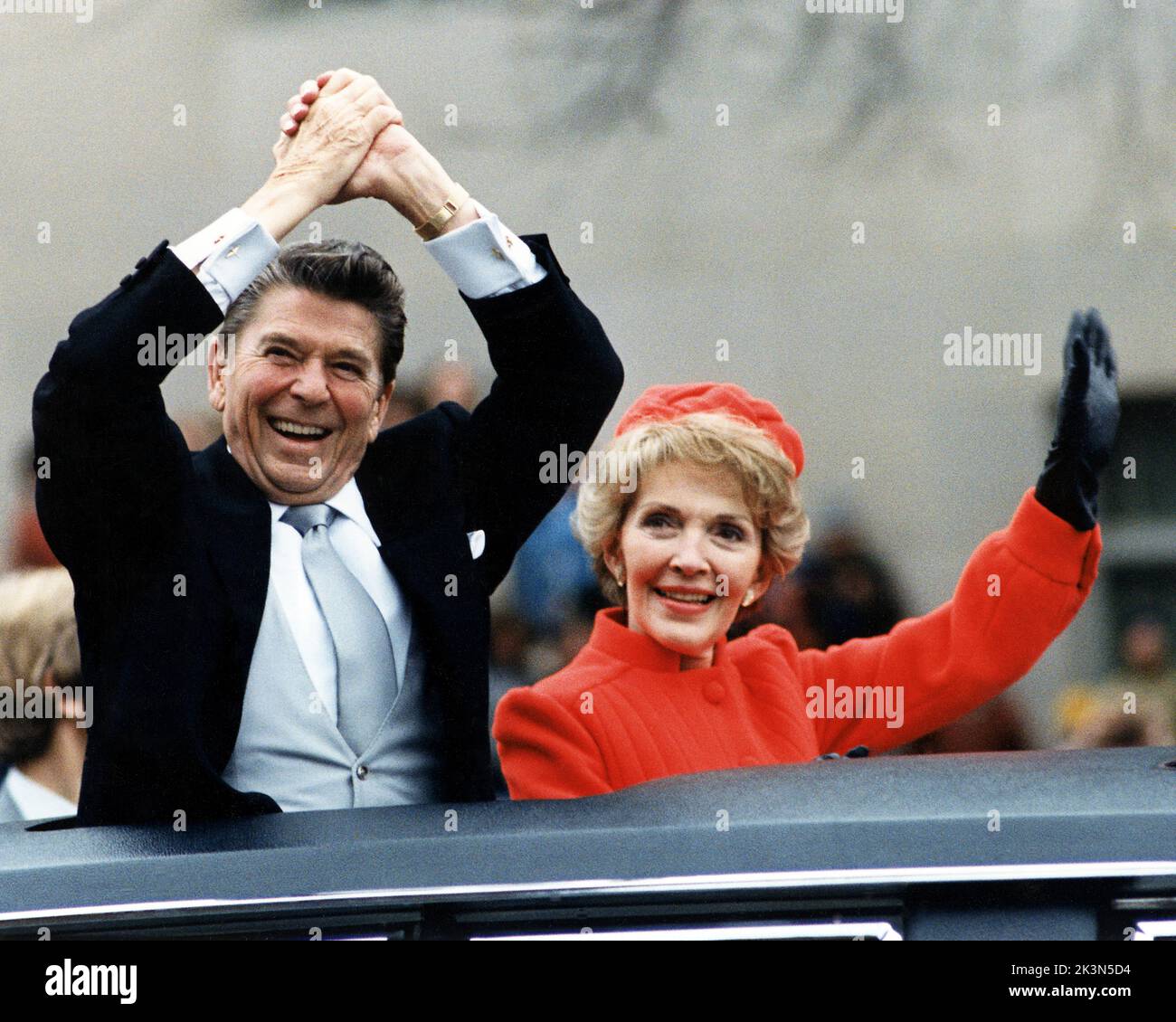 The Reagans waving during the Inaugural Parade on January 20, 1981. Stock Photo