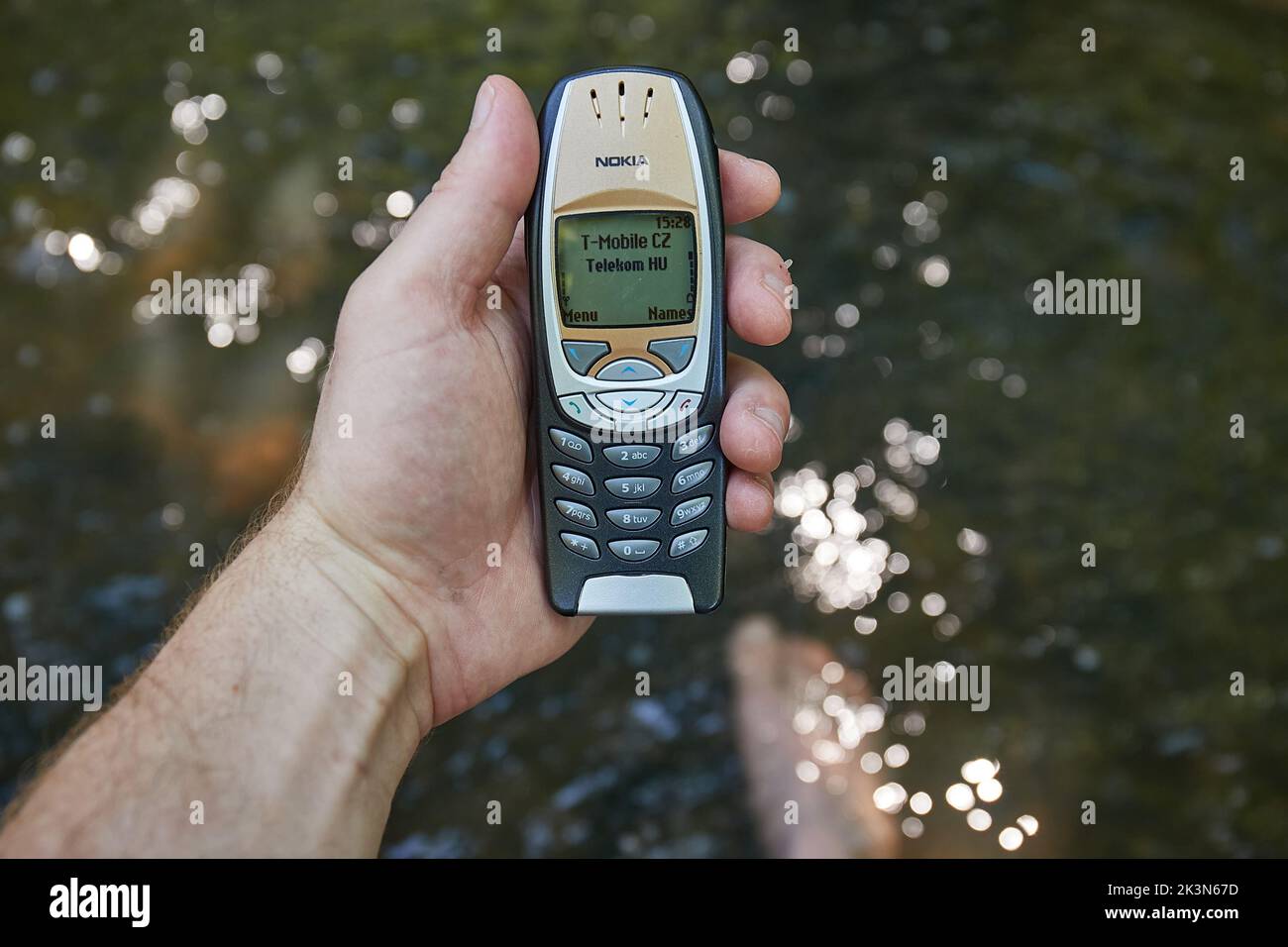 Old Nokia mobile phone outdoors Stock Photo