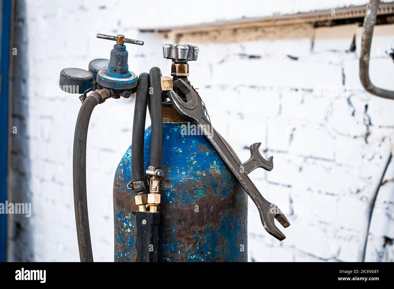 Old gas cylinders for welding and cutting. Rusty propane and oxygen