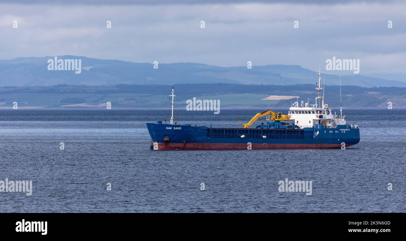 General cargo ship Hav Sand in the Firth of Clyde in Brodick Bay, Isle of Arran. The Hasv Sand was built in Germany in 1982. Stock Photo