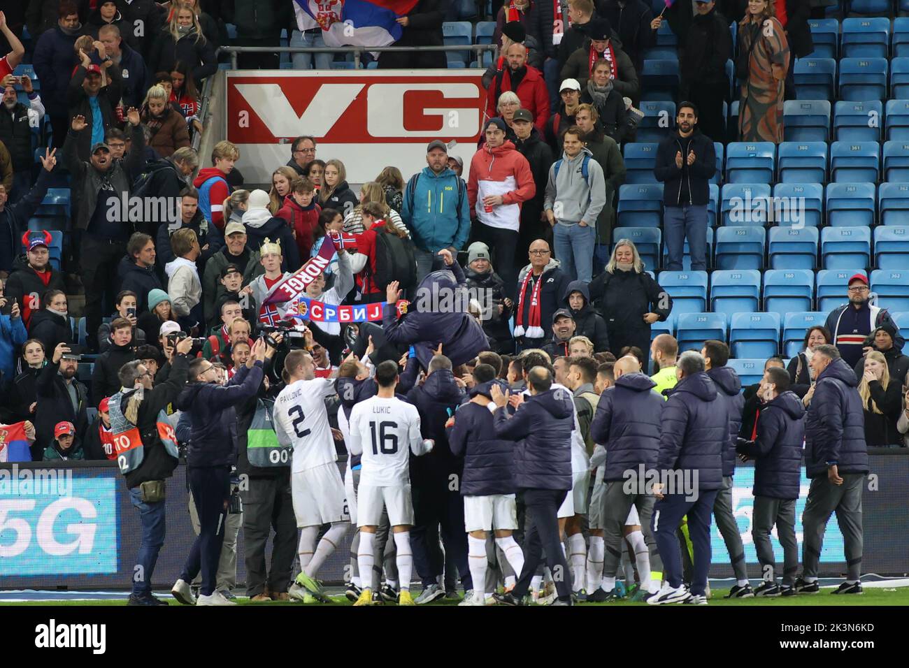 Oslo, Norway, 27 September, Serbian players celebrate by throwing Serbia's manager Dragan Stojkovic in the air , Credit: Frode Arnesen/Alamy Live News Stock Photo