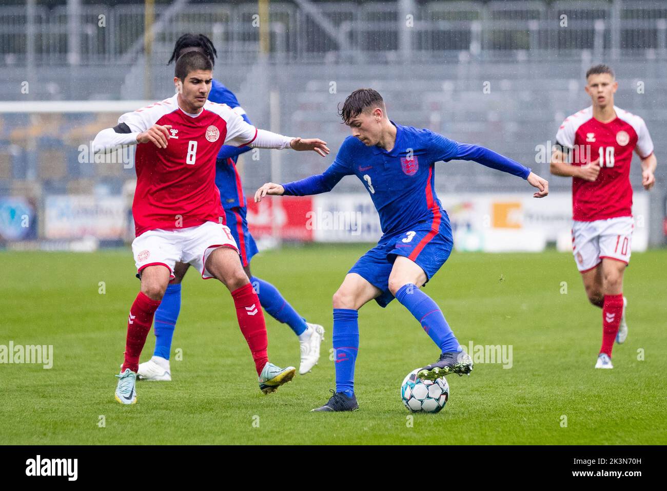Hobro, Denmark. 27th Sep, 2022. Luke Chambers (3) of England and Zidan Sertdemir (8) of Denmark seen during the UEFA U19 Championship qualifier between Denmark and England at DS Arena in Hobro. (Photo Credit: Gonzales Photo/Alamy Live News Stock Photo