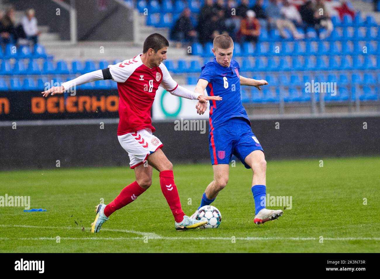 Hobro, Denmark. 27th Sep, 2022. Zidan Sertdemir (8) of Denmark and Adam Wharton (6) of England seen during the UEFA U19 Championship qualifier between Denmark and England at DS Arena in Hobro. (Photo Credit: Gonzales Photo/Alamy Live News Stock Photo