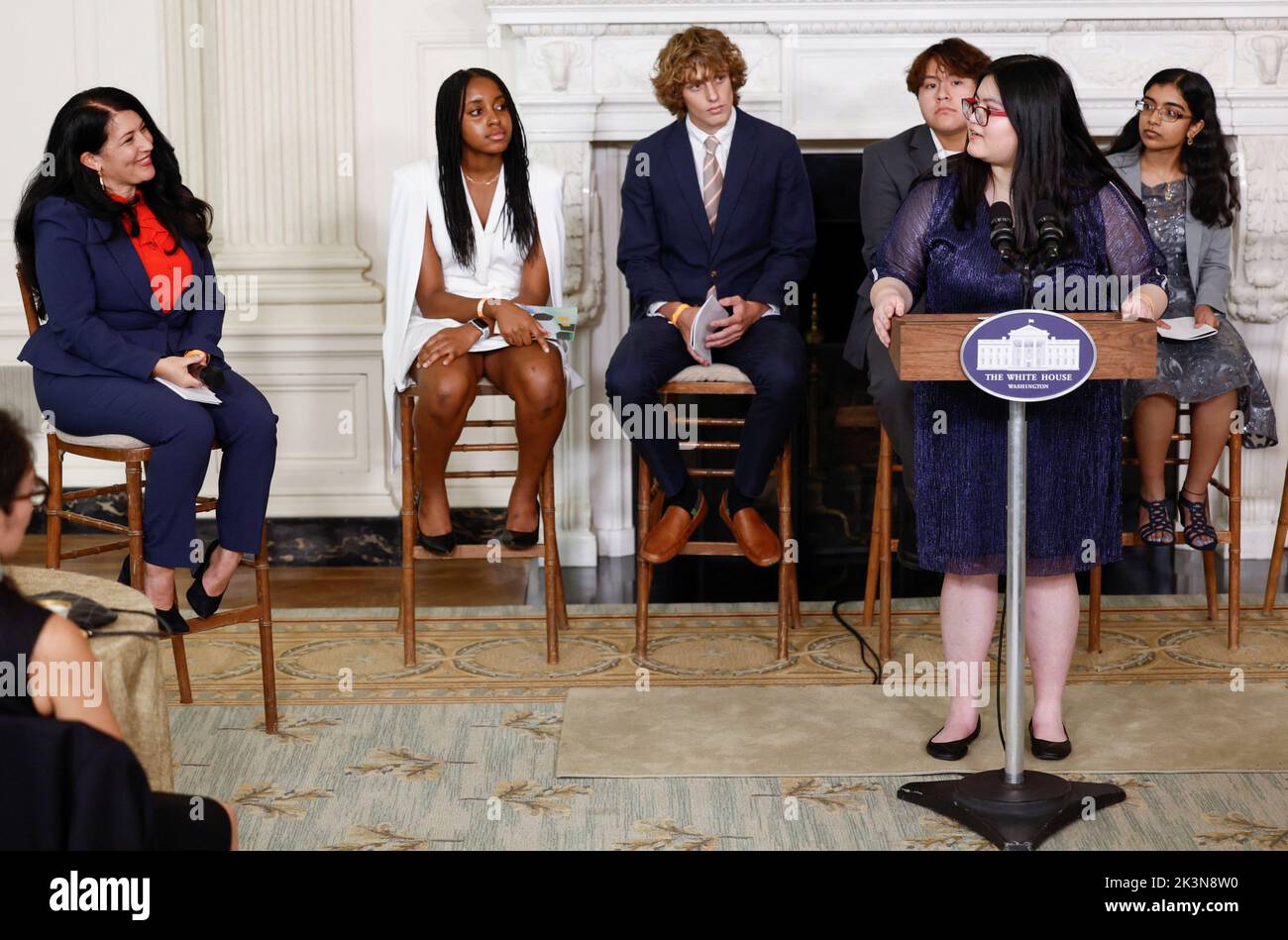 Ada Limon, the 24th Poet Laureate of the United States, asks Diane Sun, a junior at Interlake High School in Bellevue, Washington, a question about her poem during an event honoring the Class of 2022 National Student Poets Program, at the White House in Washington, U.S., September 27, 2022. REUTERS/Evelyn Hockstein Stock Photo