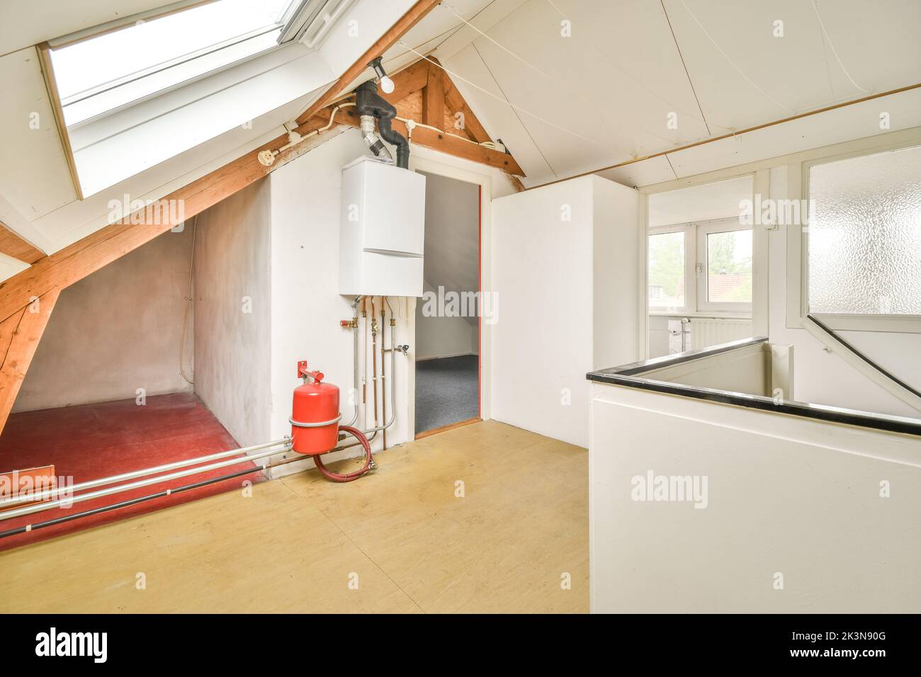 Boiler room of an apartment building with pipes and metering devices. A