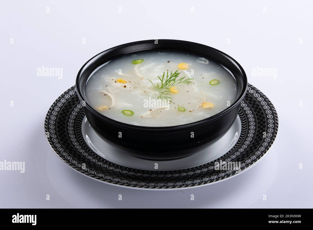 Bangladeshi style thai soup, chicken corn soup isolated on white