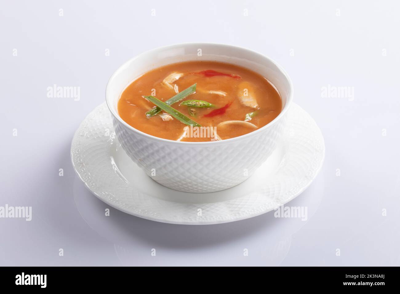 Bangladeshi style thai soup, chicken corn soup isolated on white