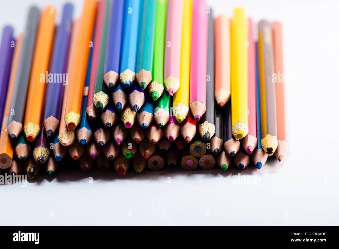 Colorful wooden pencils isolated on white background. close up Stock Photo
