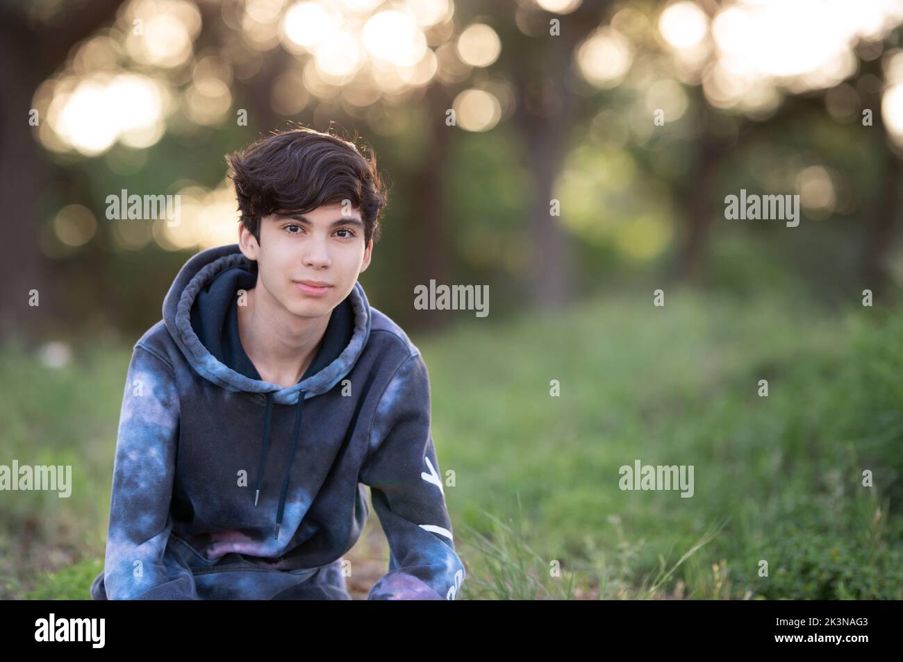 Teen Boy Portrait in the Park Stock Photo