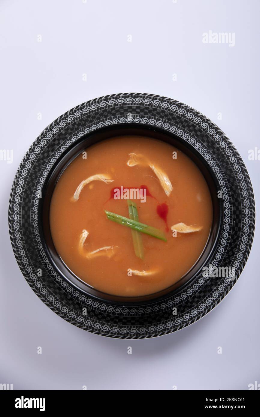 Bangladeshi style thai soup, chicken corn soup isolated on white