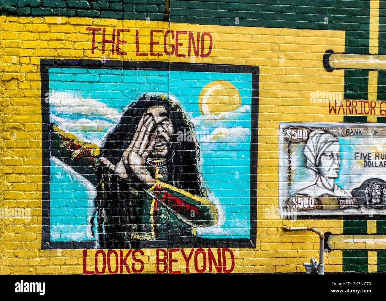 A mural of famous singer Bob Marley on the brick wall Stock Photo Alamy