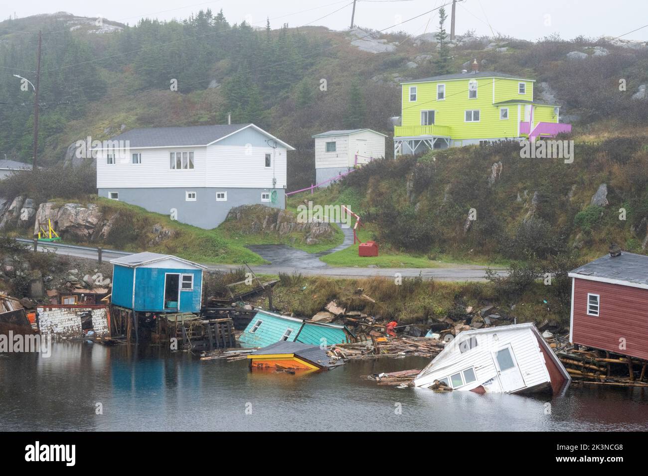 Canada, September 27, 2022, Buildings sit in the water along the shore