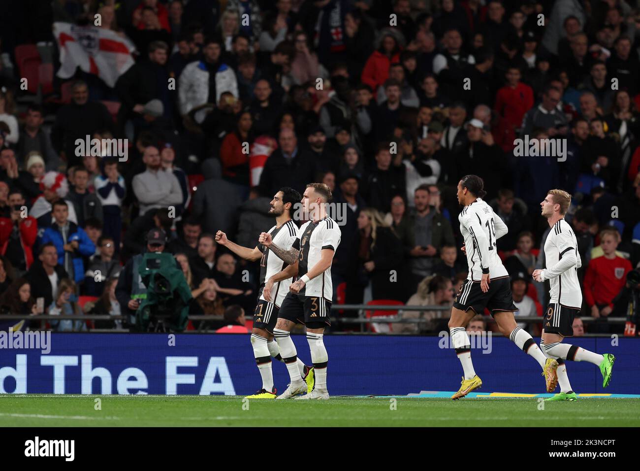 London, UK. 26th Sep, 2022. Ilkay Gundogan of Germany celebrates with his teammates after scoring a goal from penalty spot. England v Germany, UEFA Nations league International group C match at Wembley Stadium in London on Monday 26th September 2022. Editorial use only. pic by Andrew Orchard/Andrew Orchard sports photography/Alamy Live News Credit: Andrew Orchard sports photography/Alamy Live News Stock Photo