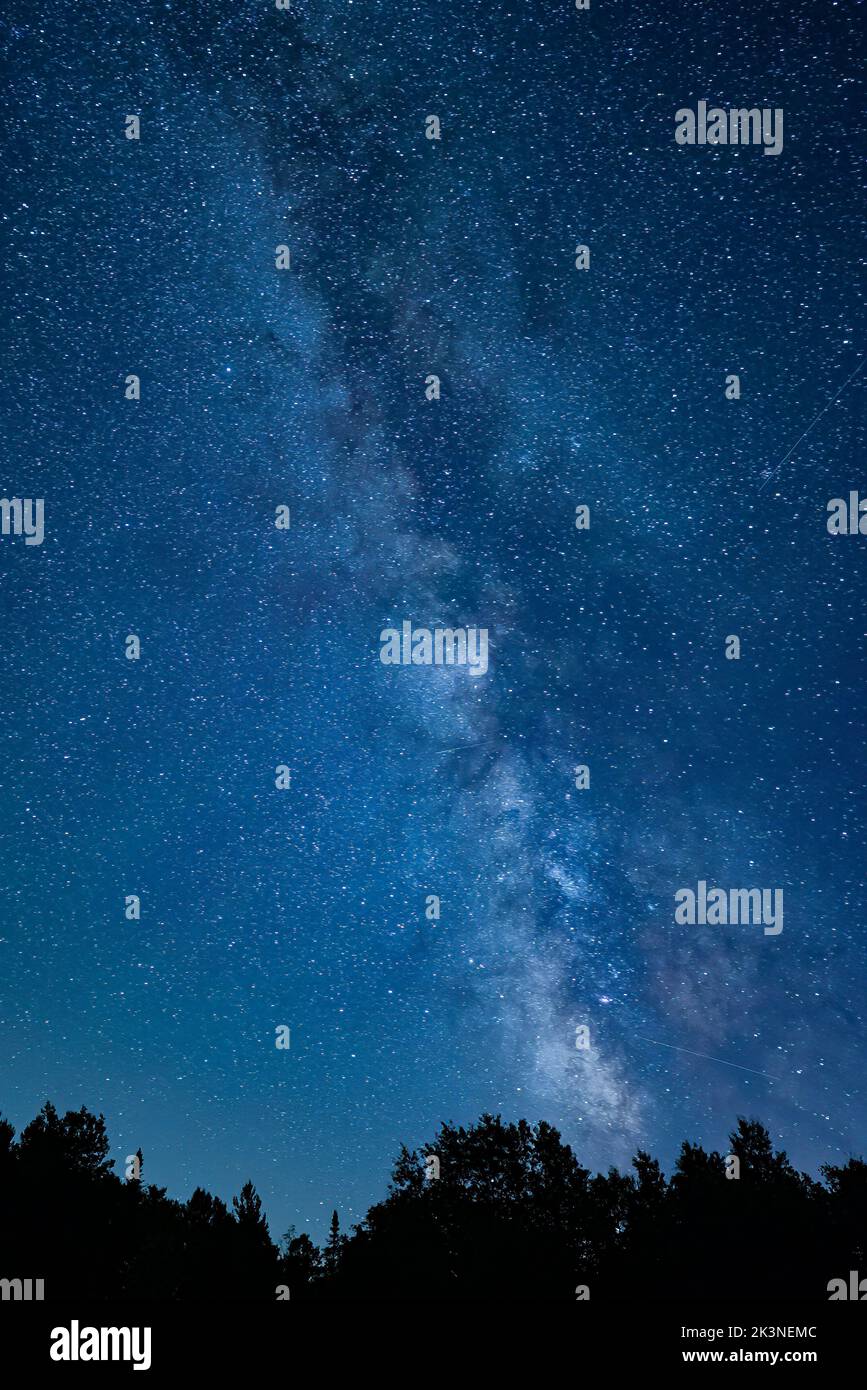A vertical view of the Milky Way from the Adirondack Mountains, NY on a clear autumn night Stock Photo